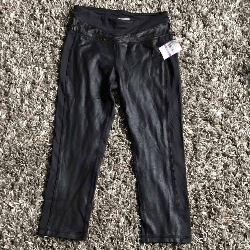 Patterned leggings size small, new